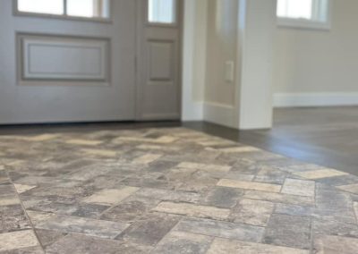 Pownderhorn new home, inside entry tile.