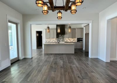 New Powderhorn, Wy custom home. living room image with vaulted ceiling.